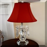 D04. Cut crystal lamp with cut hanging prisms. Some prisms damageed. 28”h - $48 